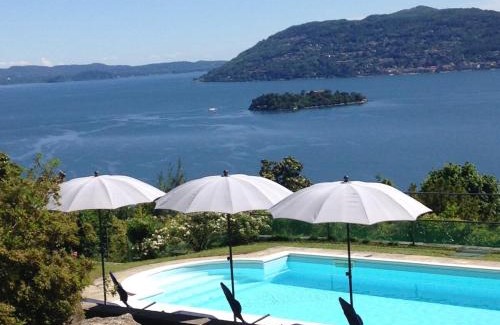 Suna Villa | Romantic Nido: Pet-Friendly Retreat with Pool Access