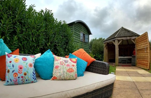 Camborne House | Romantic Getaway: Shepherds Hut with Hot Tub Awaits!
