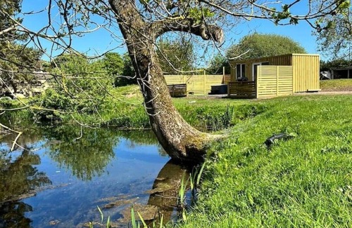 Legbourne Cabin | Romantic Riverside Cabin with Private Hot Tub & Breakfast