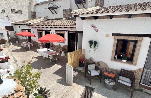 Los Carriones House | Romantic self-catering Cave House with spa bath, log fire
