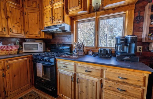 Beaver Cove House | Scenic Lake View Getaway with Hot Tub & Fireplace