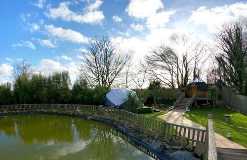 Camborne House | Romantic Treehouse Retreat with Hot Tub & BBQ Lodge