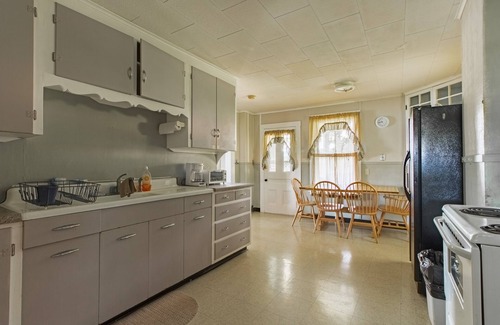 Weirs Beach House | Idyllic Romeo's Balcony: Oceanfront Retreat at Weirs Beach