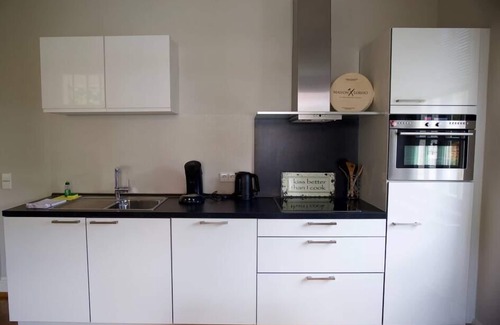 Baden-Baden Apartment | Discover Comfort at Romy Schneider with Kitchen Amenities