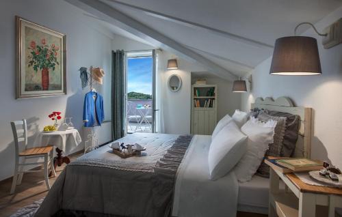 Borgo House | Roncaglia Suite: Oceanfront Retreat with Spa & High Ratings