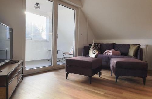 Moorhusen Apartment | Guest Rated: 9.7 at Roof Lounge – Perfect for Families!