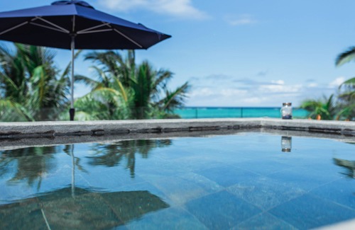 Roches Noires Villa | Rooftop Penthouse with Private Pool and Oceanfront Views