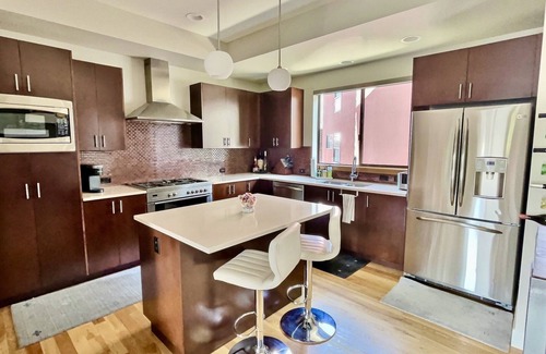 Highland House | Modern LoHi Townhome with Rooftop Deck & Spa Amenities