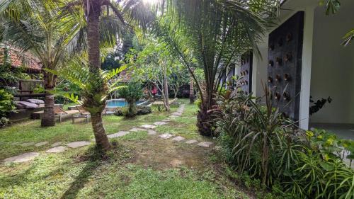 Pecatu House | Discover Mari Posa Cottage: Family-Friendly with Pool Access