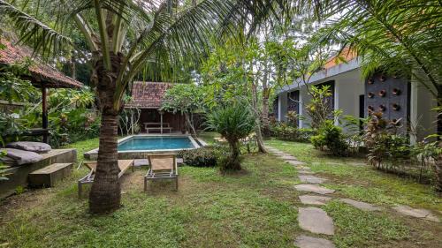 Pecatu House | Discover Mari Posa Cottage: Family-Friendly with Pool Access