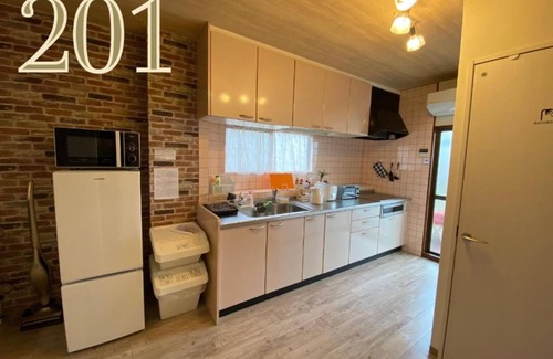 Minato Apartment | Room 201 in Osaka: Balcony, Kitchen & Perfect Score 10/10