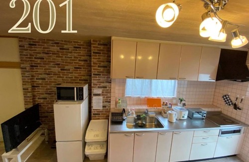 Minato Apartment | Room 201 in Osaka: Balcony, Kitchen & Perfect Score 10/10