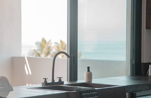 Isla Navidad Apartment | Relaxing Oceanfront Condo with Pool and Spa for 4 Guests