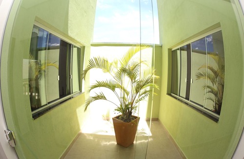 Piumhi House | Cozy Room 5 at Pousada Pérola Mineira for Family Getaways