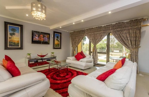 Ballito Hotel | Relaxing Double Room at Ezulwini Guest House with Pool View