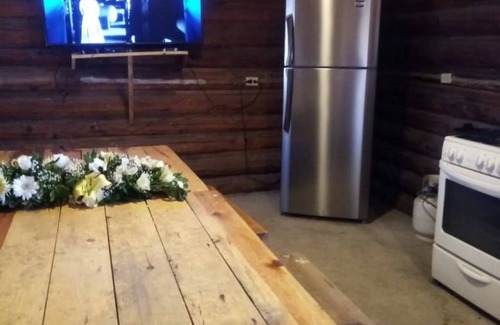 Creel Cabin | Cozy Cabin Room at Parador Arewá - Pet Friendly & Family Fun