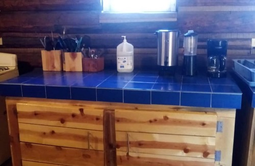 Creel Cabin | Cozy Cabin Room at Parador Arewá - Pet Friendly & Family Fun