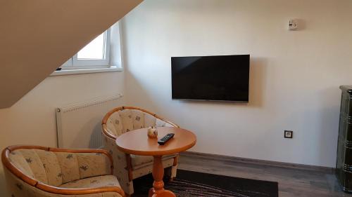 Strba Apartment | Inviting Room with High Tatras View & Cozy Fireplace