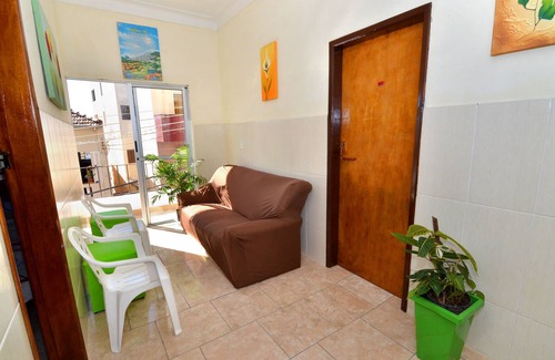 Aparecida House | Inviting Room with Balcony and Kitchen at Hotel Frei Galvão