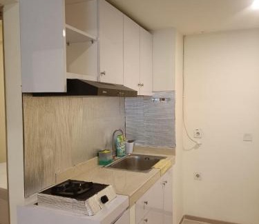 Serpong Apartment | Inviting Stay at RoomQu in Serpong Residence with Pool