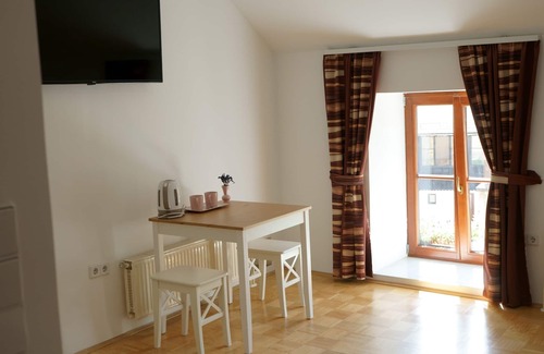 Ptuj Apartment | Modern Rooms in City Center with Castle View & Amenities