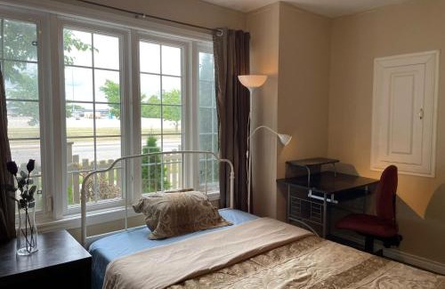 Burlington House | Convenient Rooms Steps from the Train Station