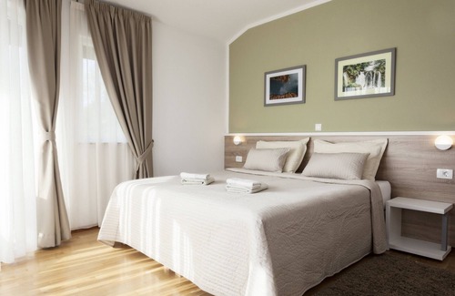 Ostarski Stanovi Apartment | Explore Rooms Zdravko: Poolside Stays in Croatia