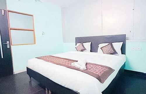 Sainik Farm Hotel | Discover Roomshala 147 KD Plazav with Breakfast Included