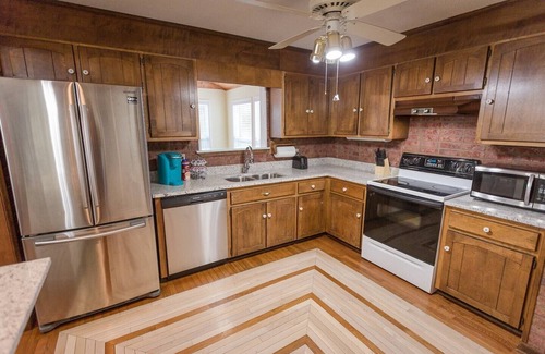 Cleveland House | Spacious Retreat: Pet-Friendly with Fenced Backyard!