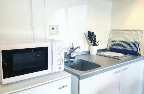 Roppongi Apartment | Eco-Friendly Escape at Roppongi Place with Hot Tub Access