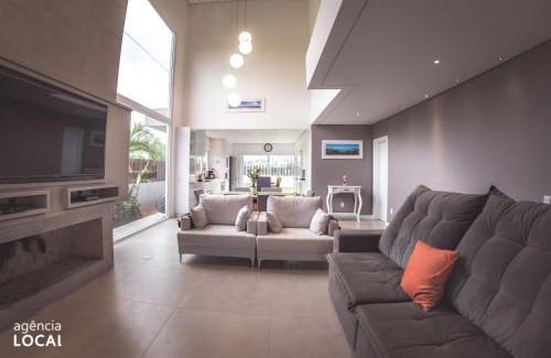 Praia do Rosa House | Indulge in Spa Bliss with Heated Pool & Ocean Views