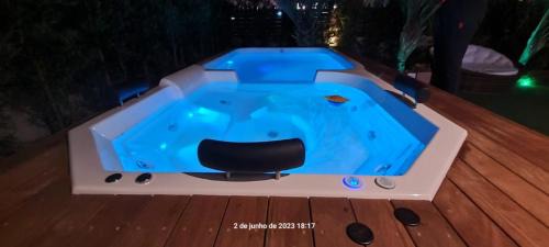 Praia do Rosa House | Indulge in Spa Bliss with Heated Pool & Ocean Views