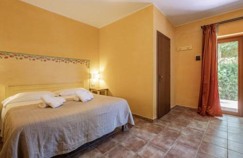 Capalbio House | Rosaspina: Family-Friendly Apartment with Pool Access