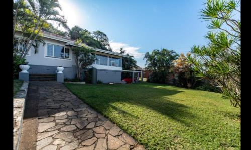 Bluff House | Rose Holiday Home: Pet Friendly Oasis with Ocean View