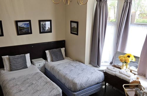Peterborough House | Discover Rose Marie Guest House: Family-Friendly Retreat