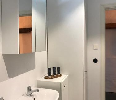 Flyinge Apartment | Roslövs Gård: Idyllic Retreat in Nature's Embrace