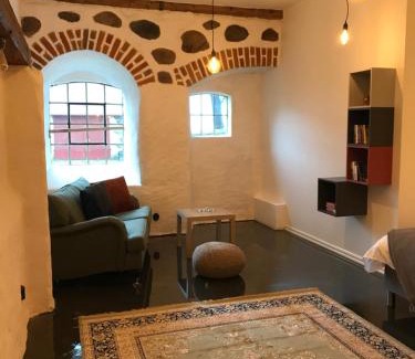 Flyinge Apartment | Roslövs Gård: Idyllic Retreat in Nature's Embrace