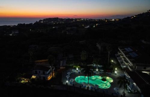 Ricadi Apartment | Experience Rosy Hotel Residence: Oceanfront Bliss Awaits