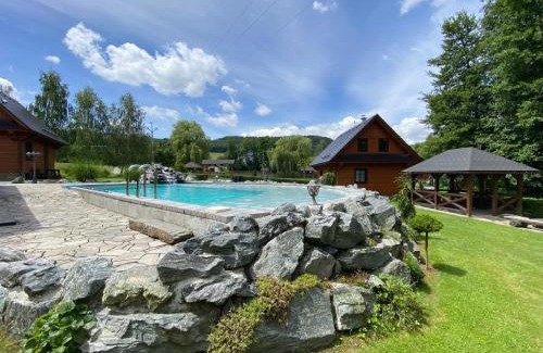 Sobotin Apartment | Exquisite Roubenky u zvonice: Oceanfront Retreat with Pool