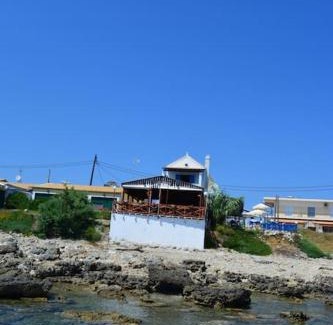 Ag. Georgios Apartment | Rousalis Studio: Oceanfront Retreat in Corfu, Greece
