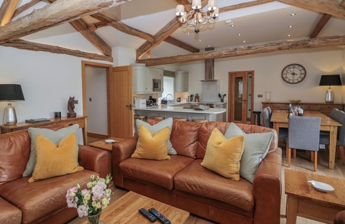 Penny Bridge Cottage | Family-Friendly Rowan Cottage with Spa and Hot Tub