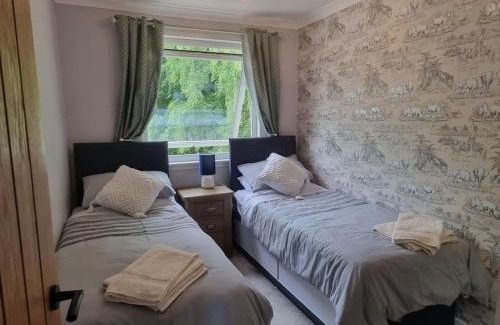 North Kessock House | Pet-Friendly Rowanlea Cottage with 9.7/10 Guest Rating