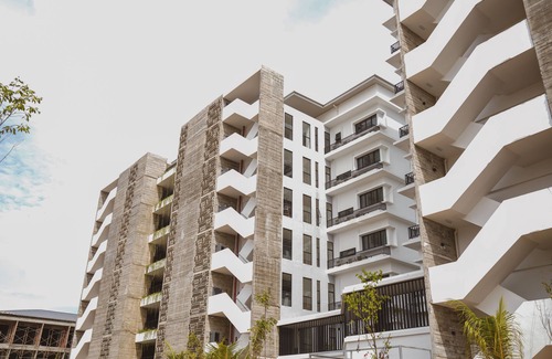 Sematan Apartment | Cozy Roxy Beach Apartment with Pool and Family-Friendly Perks