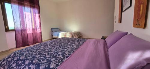 Aprilia Apartment | Roxy Bellavista: Family-Friendly Retreat with Hot Tub Access