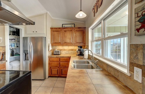 City-by-the Sea House | Oceanfront Royal Estes 5 Bedroom Home with Restaurant Access