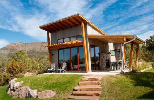 Canon City Resort | Experience Royal Gorge Cabins: Eco-Friendly Retreat with Hot Tub