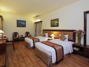 Nguyen Hue Walking Street Hotel | Elegant Retreat at Royal Hotel Saigon with Pool & Dining