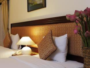 Nguyen Hue Walking Street Hotel | Elegant Retreat at Royal Hotel Saigon with Pool & Dining