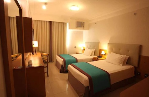 Macae Hotel | Discover Royal Macaé Palace Hotel: Pool, Spa & Family Fun