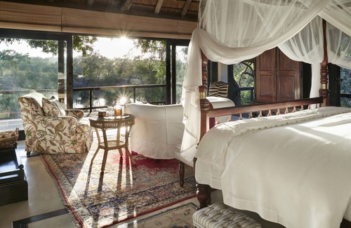 Thorny Bush Game Reserve Cabin | Indulge at Royal Malewane: Eco-Friendly Retreat with Spa